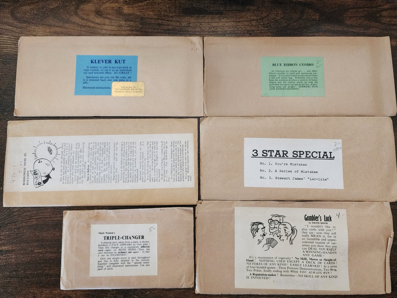 8 Tricks in 6 Envelopes - The Supreme Magic Co. (SM2)