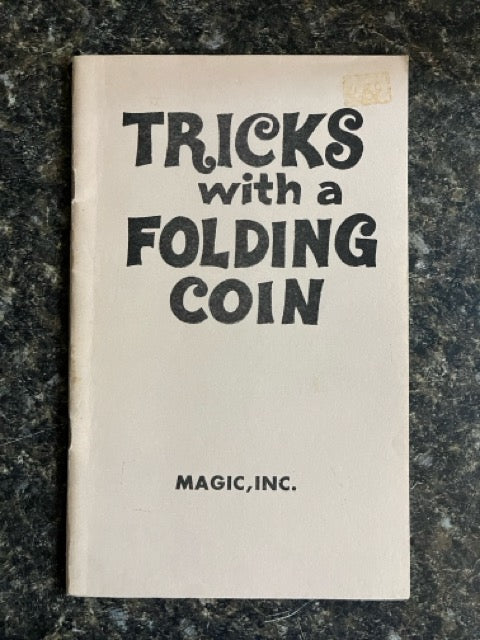 Tricks With a Folding Coin - Magic, Inc.