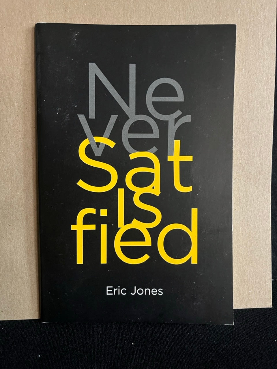 Never Satisfied - Eric Jones