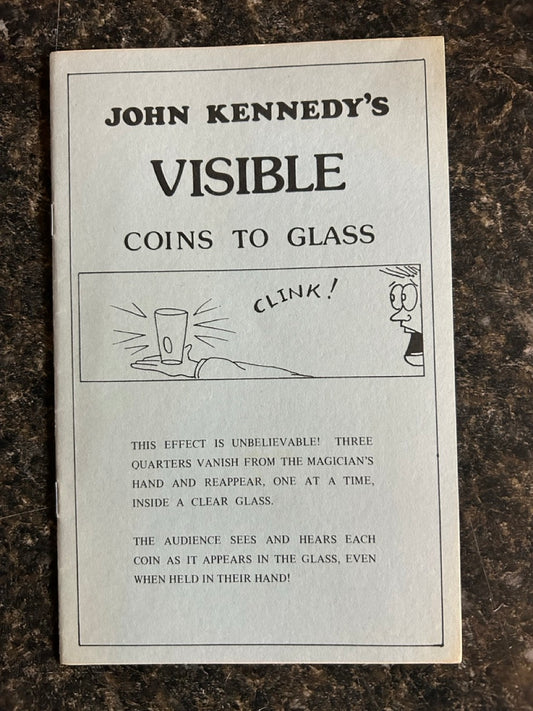 John Kennedy's Visible Coins To Glass
