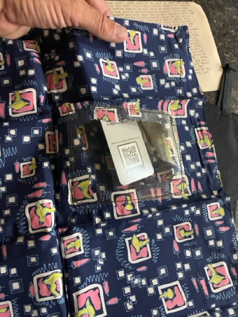 Patterned fabric with a visible secret pocket